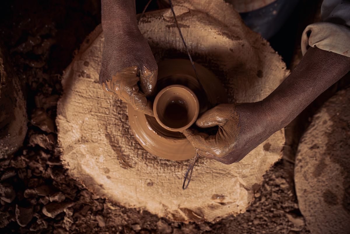 Clay pot on a potter's wheel